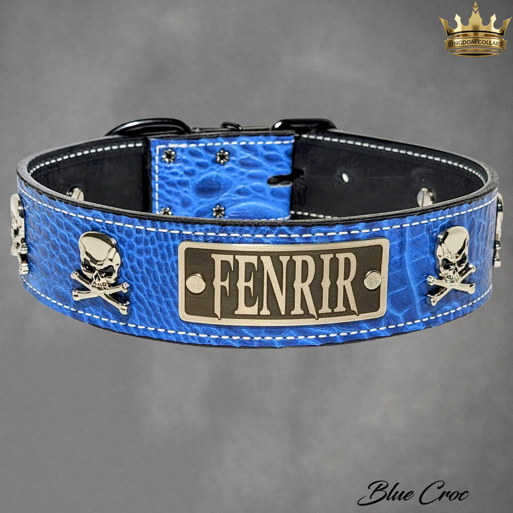 Blue crocodile-patterned dog collar with 'Fenrir' branding on a gray background