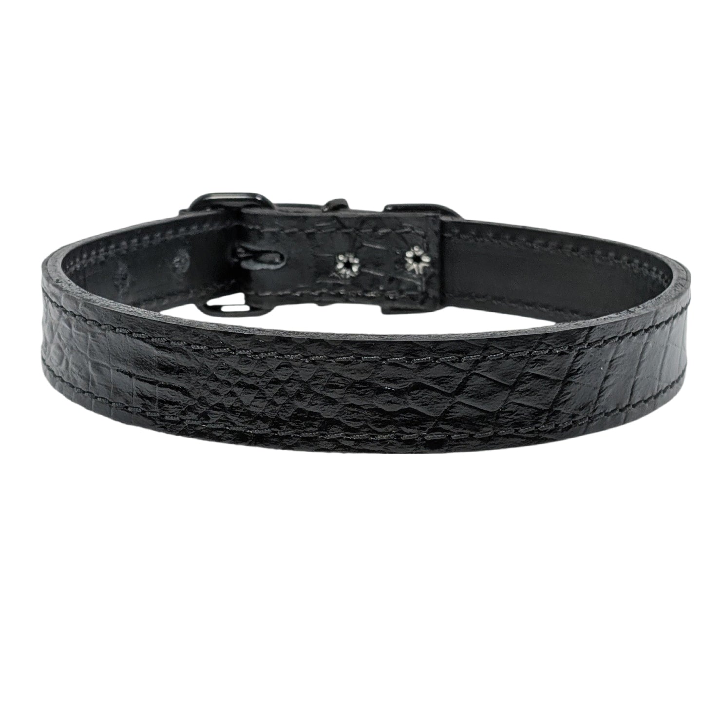 Black leather dog collar with a textured pattern on a white background
