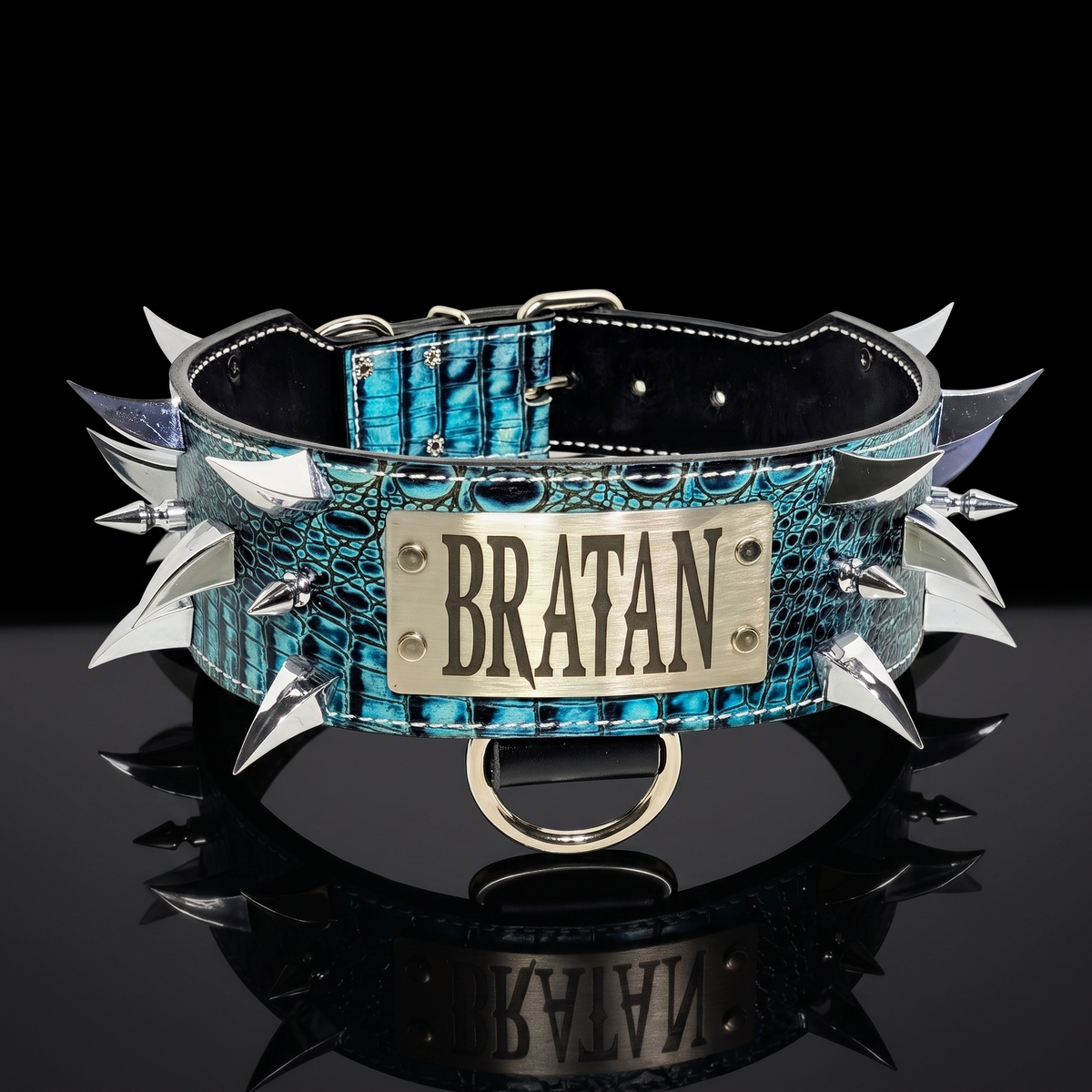 Blue spiked leather collar with 'BRATAN' tag on a black background