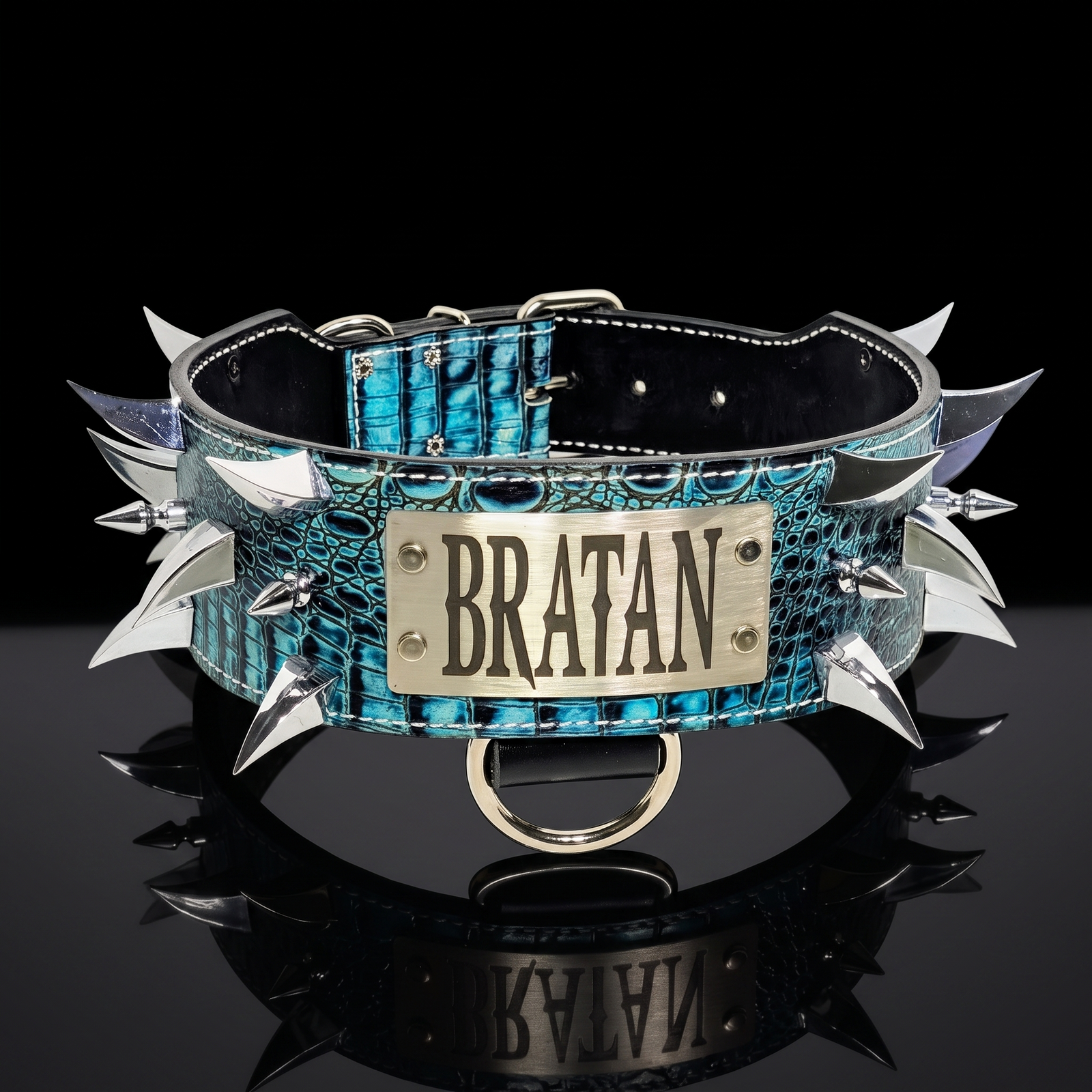 Blue spiked leather collar with 'BRATAN' tag on a black background
