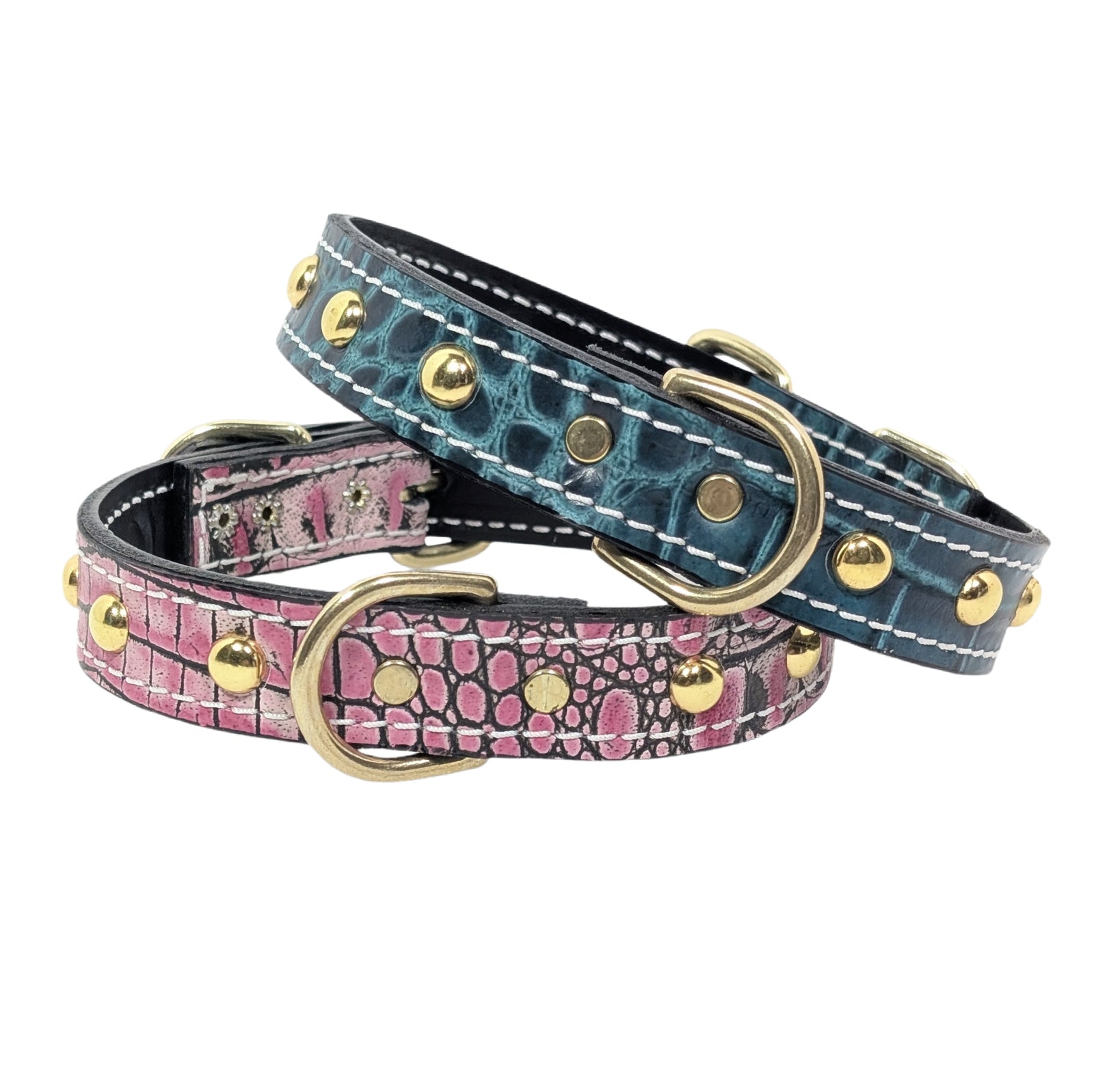 Two dog collars with patterned leather and gold studs on a white background