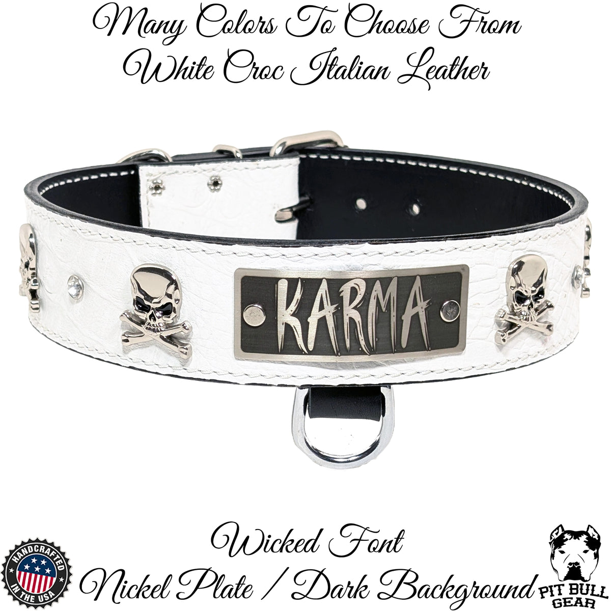 A white croc Italian leather dog collar with skull and crossbones conchos, a custom engraved nameplate, and a metal buckle.